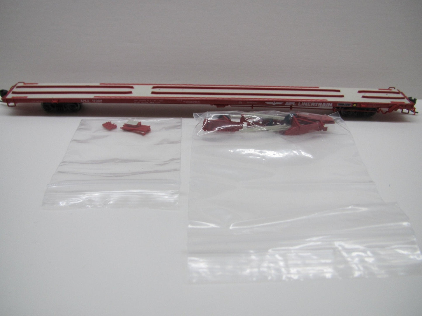 Atlas 50 004 430 N, ACF 89' 4" Flat Car, Mid/End Hitches, APL, Linertrain, APLX, 17073 - House of Trains